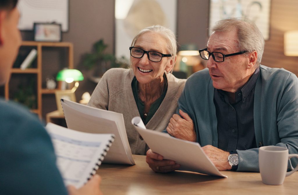 Senior couple with their financial adviser