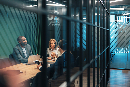 business owner discussing business with partners